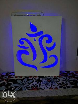 New White mdf wood gnesh pic art with blue led lighting