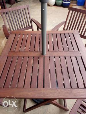 Outdoor wooden furniture. set of 4 chairs and one