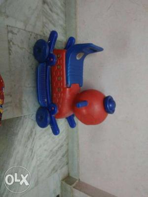 Red And Blue Plastic Ride-on Toy