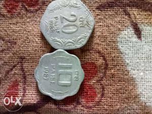 Silver-colored 20 And 10 Indian Paise Coins