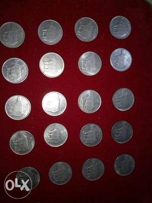 Silver-colored 25 Indian Paise Coin Collection