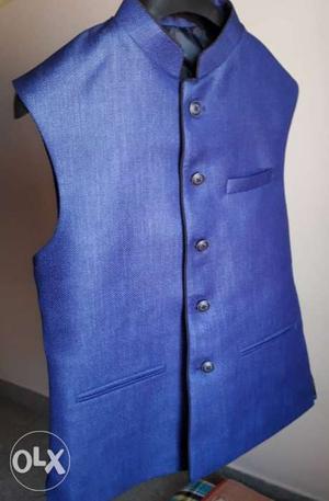 Sparingly used blue colour waist coat 39cm size