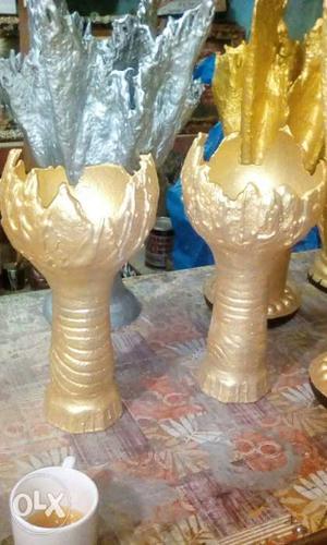 Two Gold-colored Candle Holders
