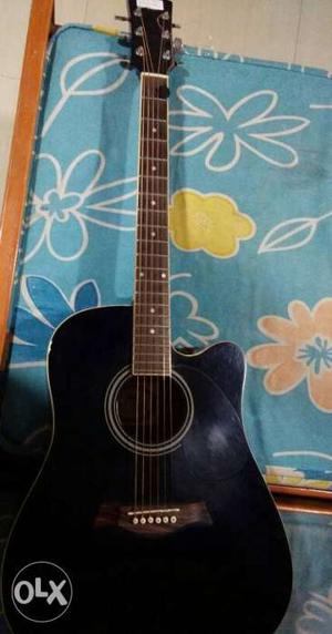 Wooden full size acoustic guitar (Xtag) nearly new