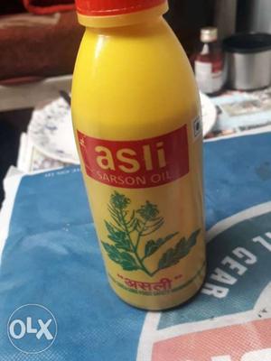 Yellow And Red Labeled Bottle