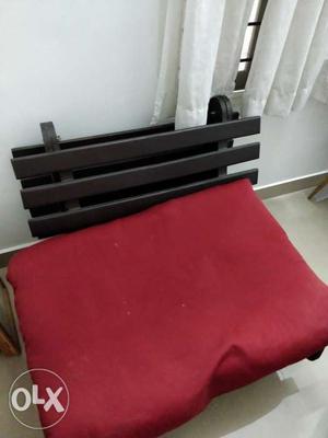 Futon that can be used folded into a chair or