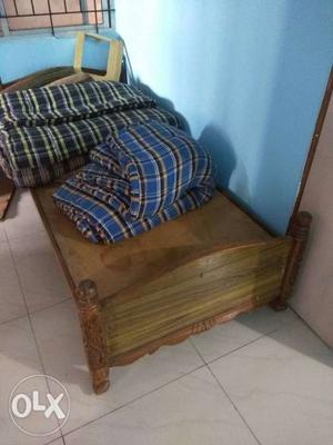 Wooden cot with 4 mattresses