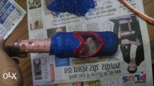 Blue And Red Plastic Bottle