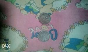It's a old 25 paise silver and gold colour coins