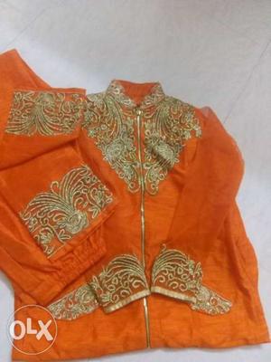 Orange plazo suit with full of embroidery