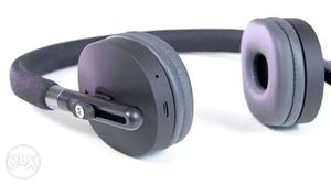 Original Brand wireless headphones of "moto" read
