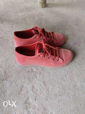Pair Of Pink Low-top Sneakers