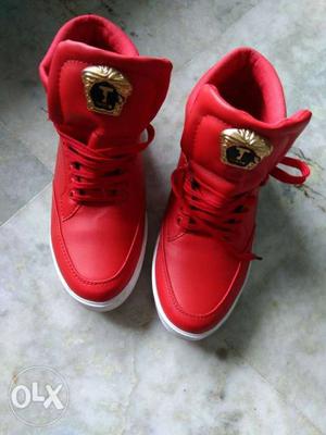 Pair Of Red Basketball Shoes