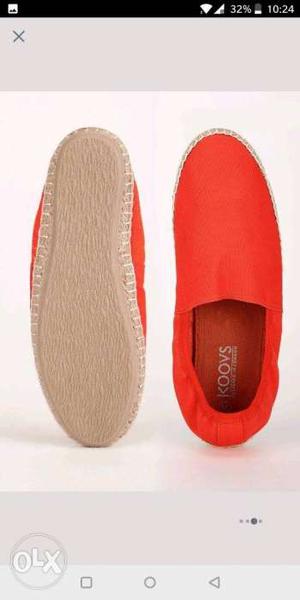Pair Of Red Slip-on Shoes