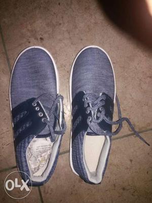 Pair of two sneakers. nyc and not used a single