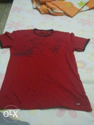 Red Levis Tshirt For Sale. Good Condition