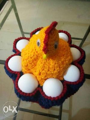Yellow, Red, And Blue Knitted Egg Holder