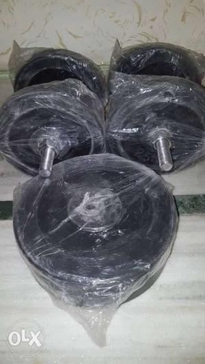 1 set of 5 kg dumbbells and extra 10 kg weight, brand new.