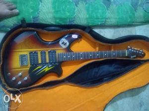 Black And Brown Electronic Guitar With Case