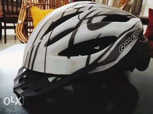 Brand new, unused RALEIGH bicycle helmet. SAFETY COMES