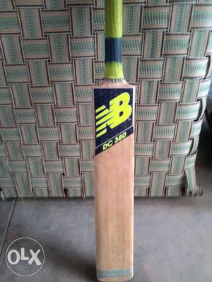 Brown And Yellow New Balance DC 380 Cricket Bat