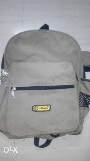 Grey color backpack 28 l in very nice condition.