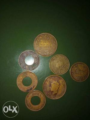 Seven Round Brown Coins
