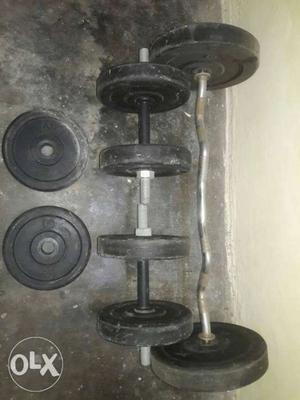 Two Black Dumbbells With Barbell