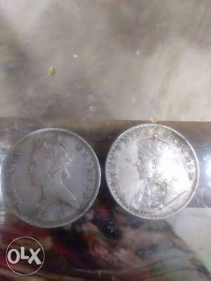 Two Silver-colored British Indian Coins