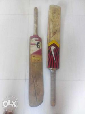 Two bats Original SG leather bat and original nike drive
