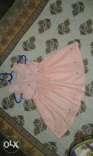 A cotton fabric frock for 3 to 4 years baby girl