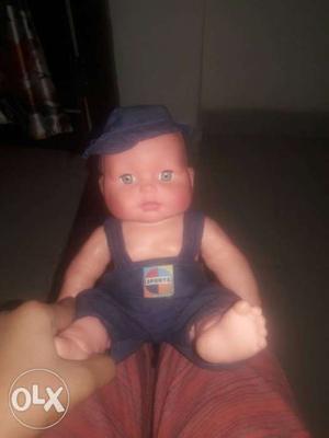 Baby With Black Jumpsuit And Cap Plastic Figurine