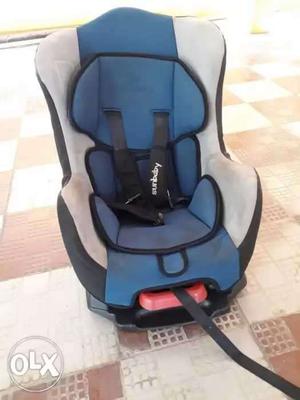 Baby's Blue, White And Black Car Seat Carrier