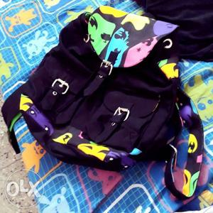 Black, Yellow, And Pink Backpack