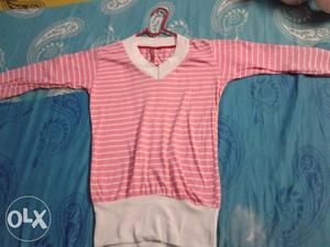 Never used, it's totally a new pink top for women