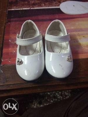 Pair Of White Leather Mary Jane Shoes