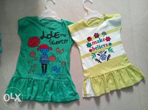 Two Girl's Green And Yellow Cap-sleeved Shirts