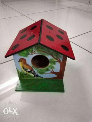 White And Multicolored Bird House