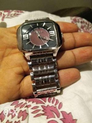 Its fossil stainless steel watch. it's water