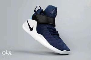 Men's White And Blue Nike Sneaker