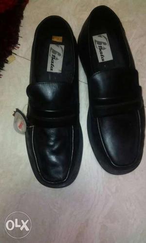 New Pair Of Black Leather Shoes by Bata