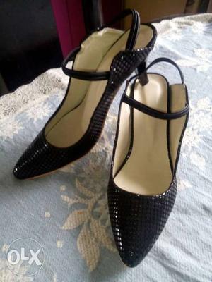 Pair Of Black Leather Pointed-toe Heeled Shoes