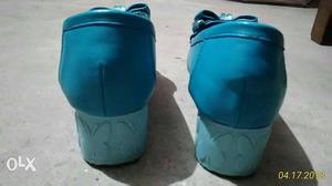 Pair Of Women's Blue Shoes