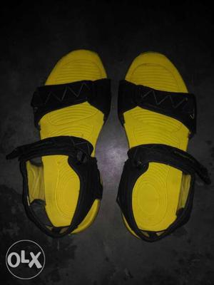 Pair Of Yellow-and-black Hiking Sandals new 4 din use kre
