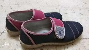 Pair Of blue and-pink Low-top Shoes