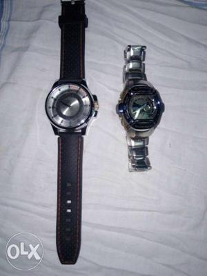 Two Round Silver-colored Watches