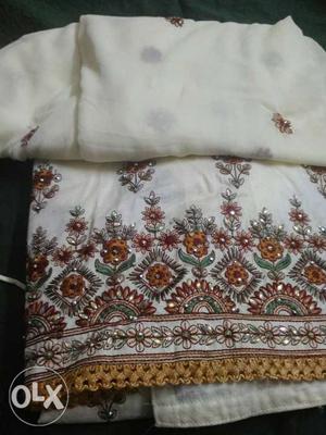 White And Brown Floral Embroidered Textile