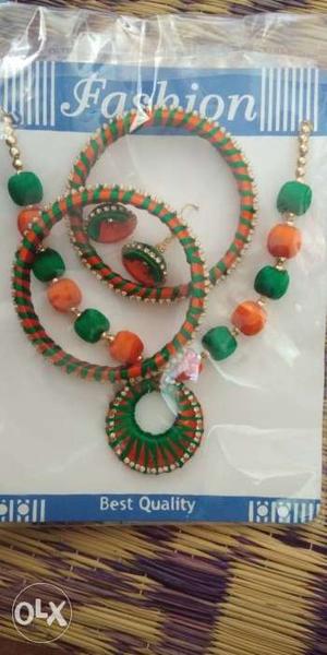 White, Green, And Red Beaded Necklace