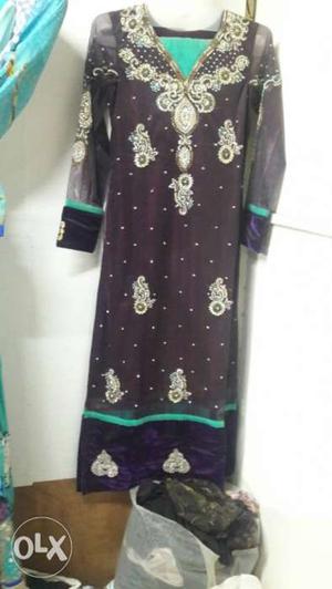 Wine colored long kurta...with heavy embroidered