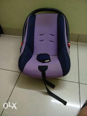 Baby's Purple And Black Safety Seat